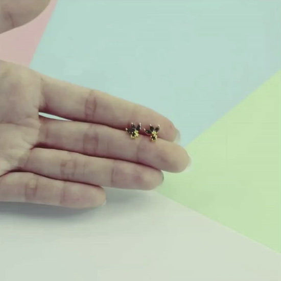 A video showing the Laura Studs in Black Zircon.