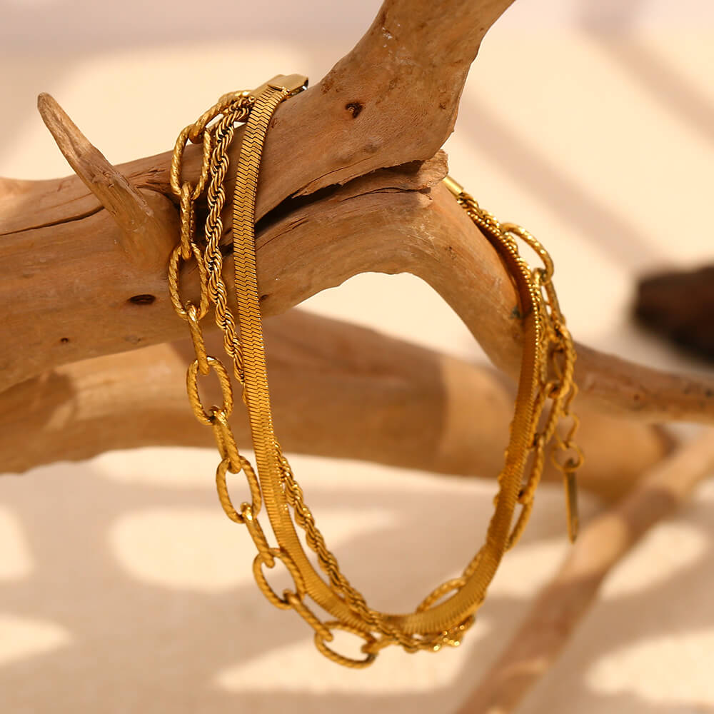 Closeup of the Multi-Layered Gold Bracelet Stack.