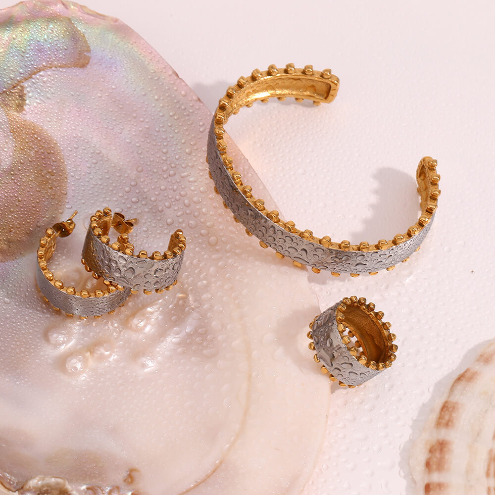 Waterproof mixed metal bangle bracelet.