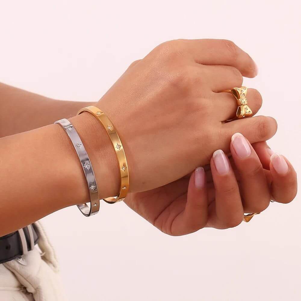 A woman wearing the Star CZ Cuff Bracelet.