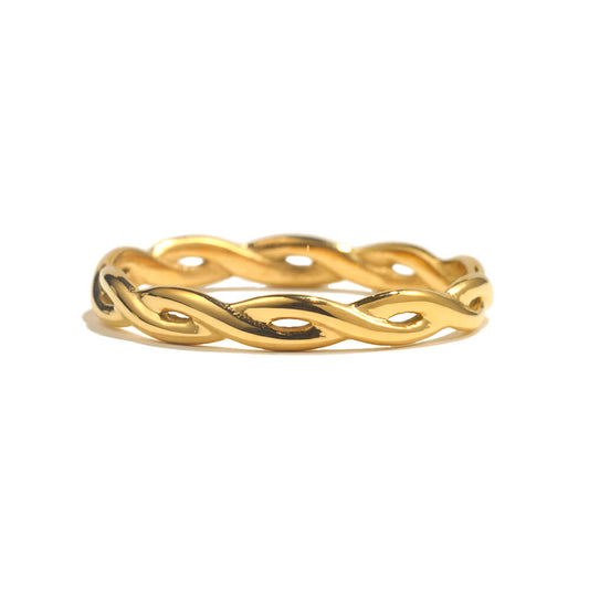 Gold ring with a woven design on a white background.