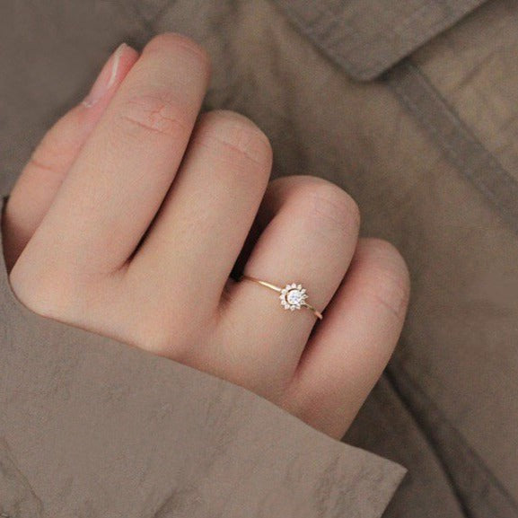 A model wearing the gold Sunflower CZ Ring.