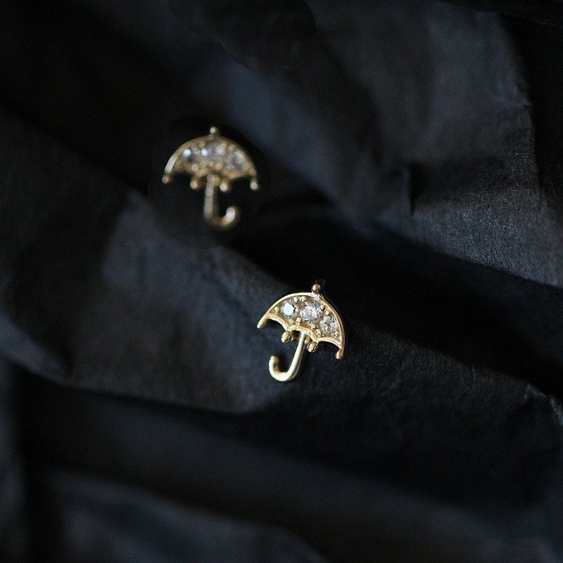 Closeup of the Tiny CZ Umbrella Studs.