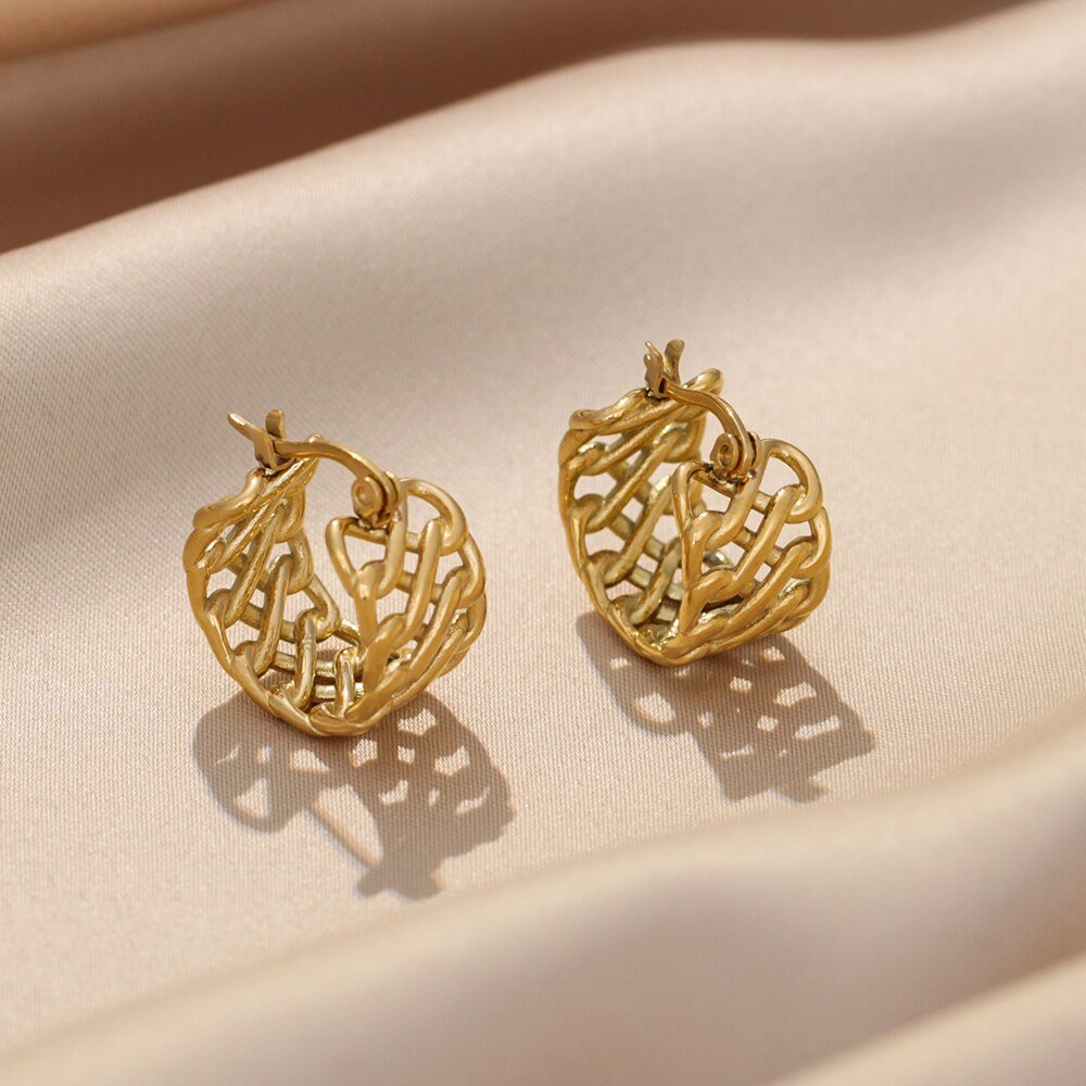 Woven Gold Hoops with a snap closure.